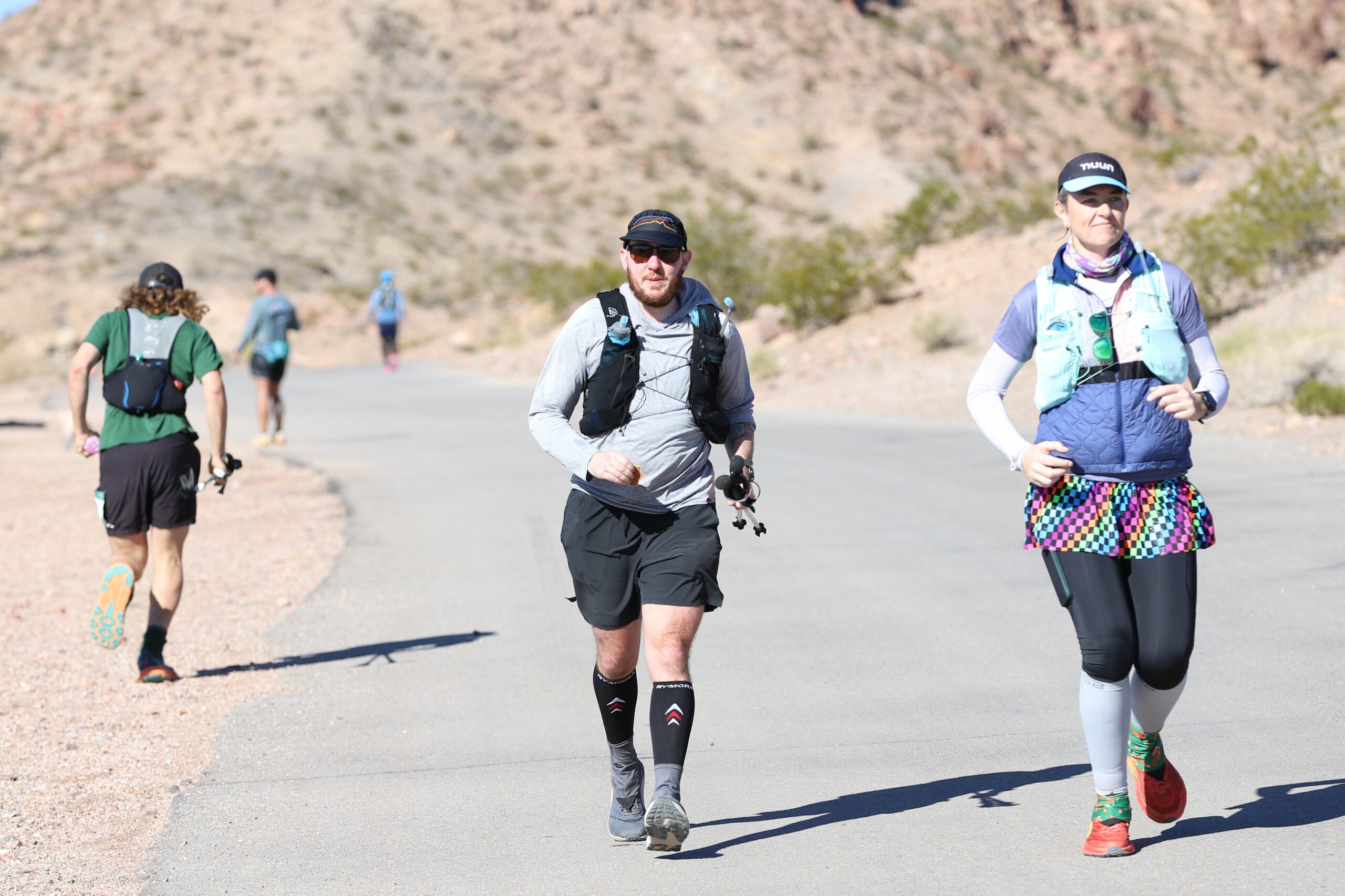 Trail runners running a half marathon trail race in the Mojave Desert, Nevada.
